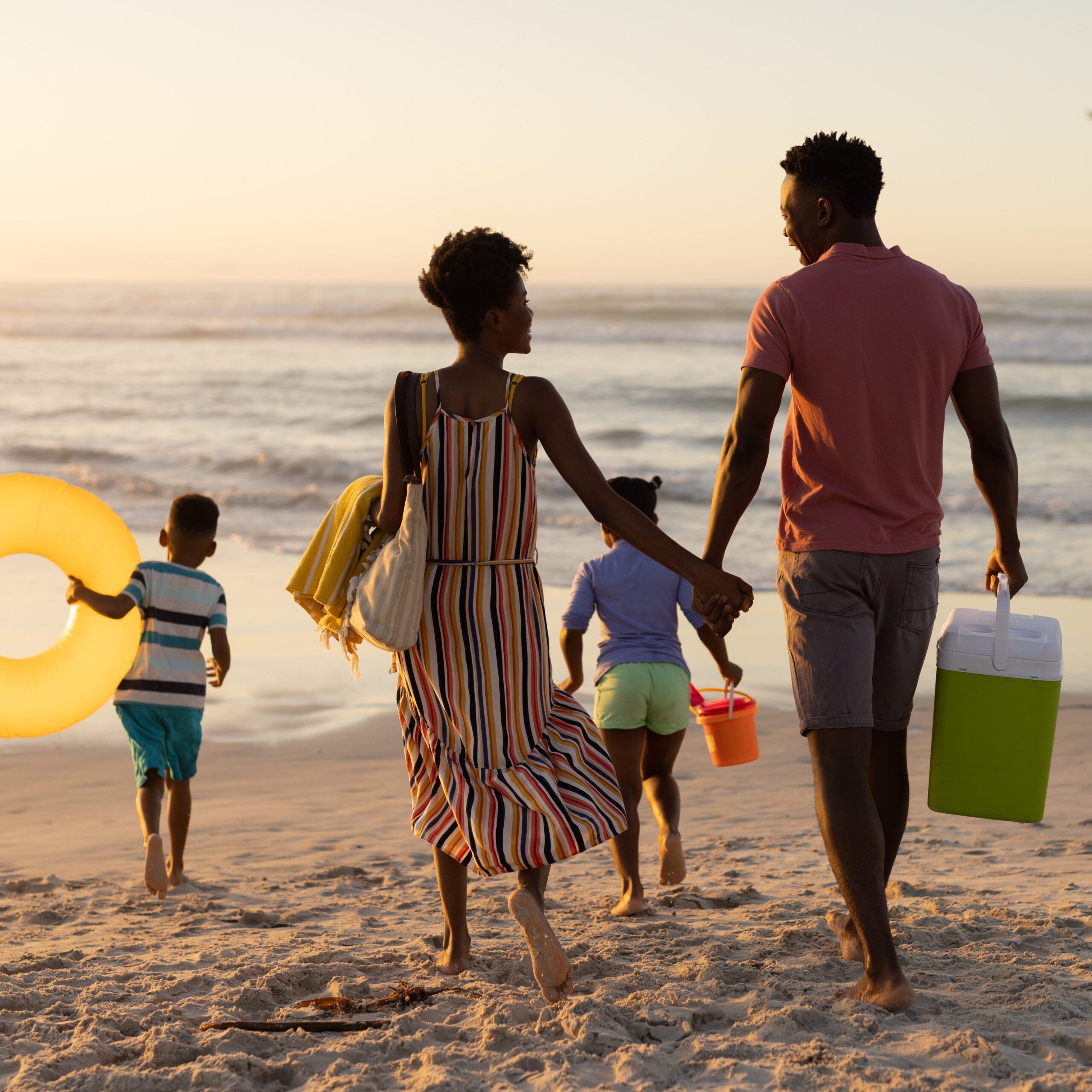 Family walking on beach